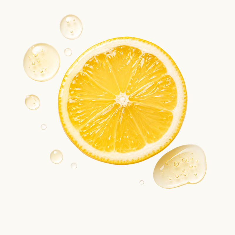 A fresh yellow orange slice with water droplets on a clean white background.