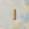 animation of capsule where capsule opens and powder flows out and then back in as capsule closes