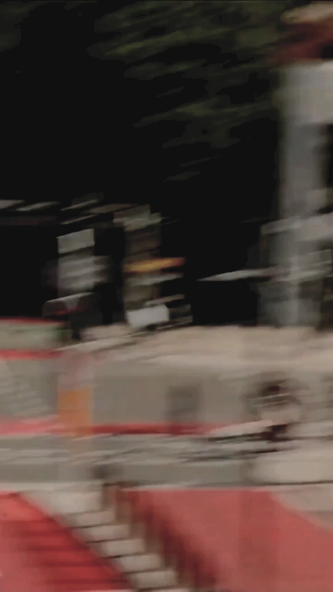 Camera zooming in on different women carrying GoSol shopping bags while walking around the city